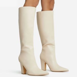 POINTED TOE BLOCK HEEL CALF BOOT IN NUDE FAUX LEATHER